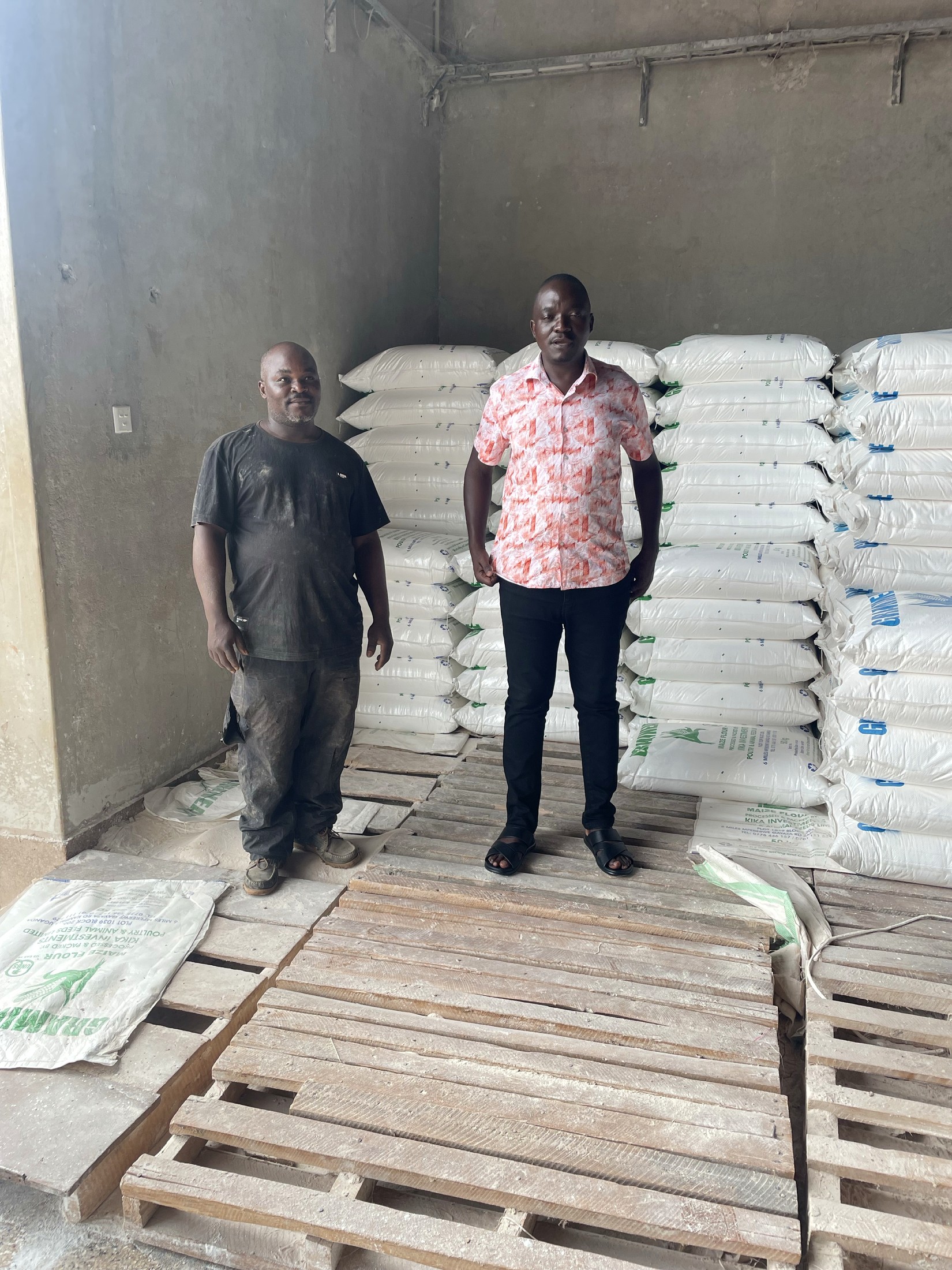 Nunda William with a colleague during a site visit